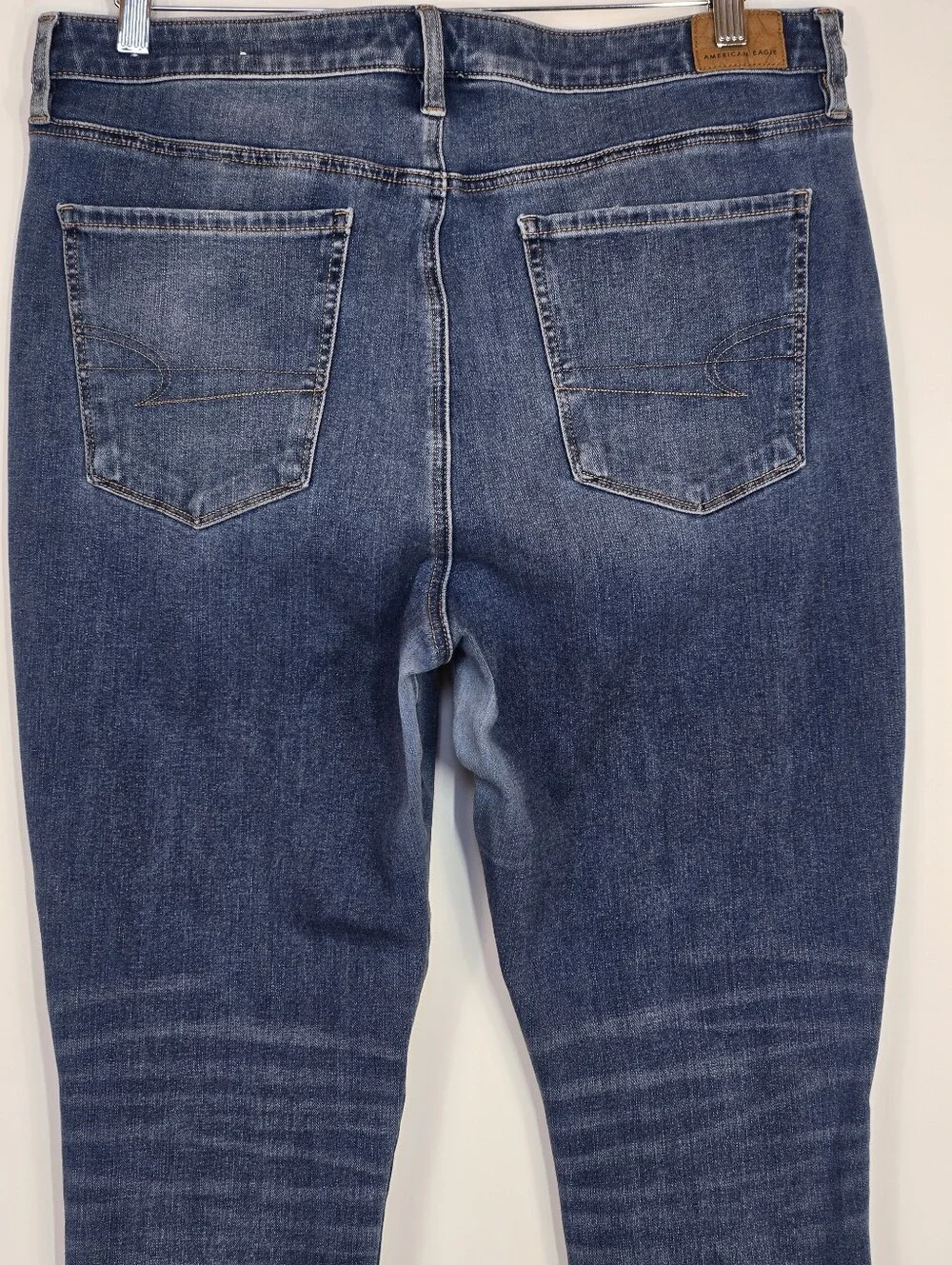 American Eagle Dream Super Hi-Rise Jegging Jeans  Distressed Raw Hem 16